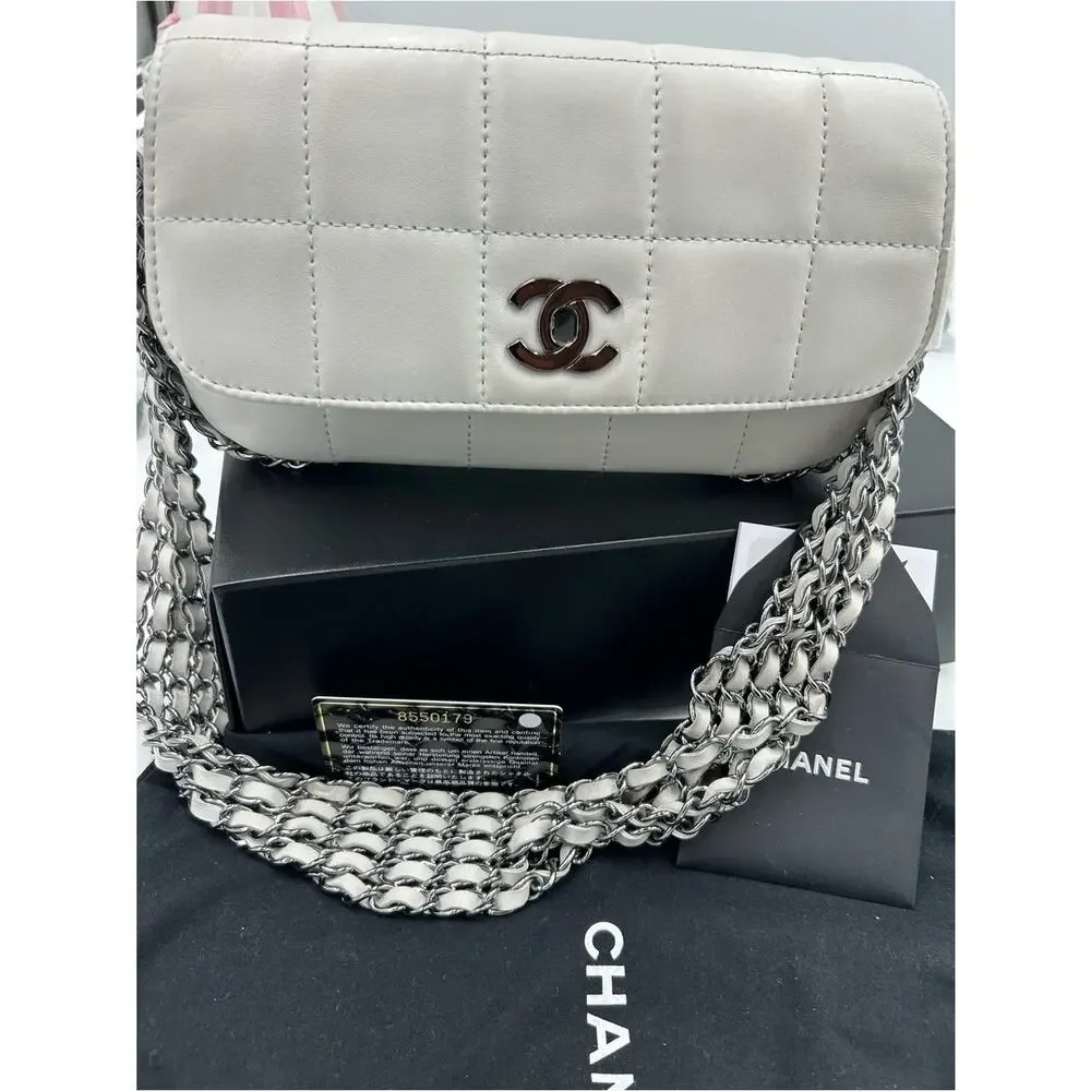 Women's vintage Chanel multi chain quilted flap bag made in Italy PRISTINE